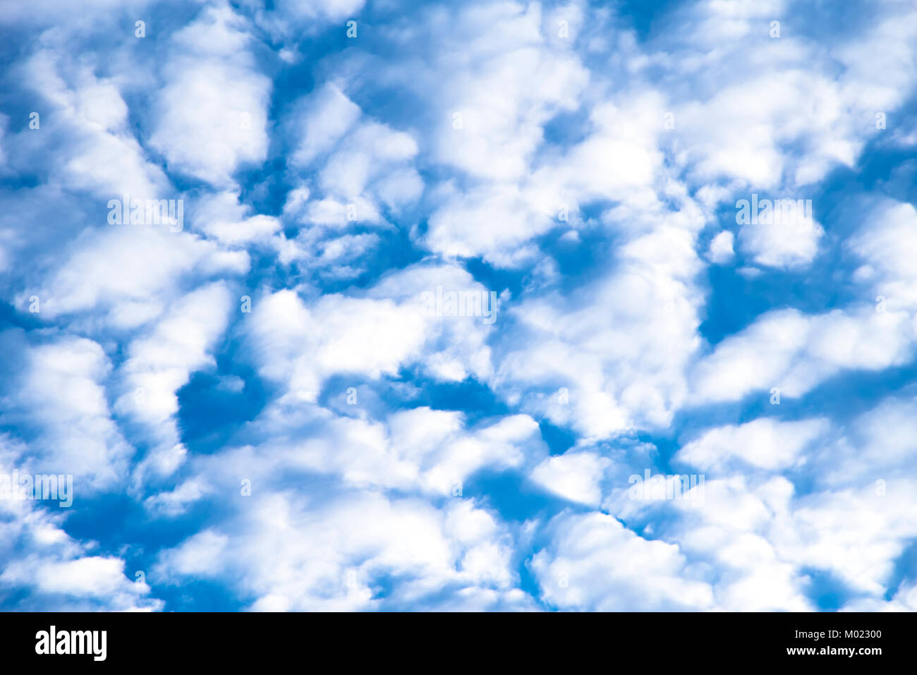 Fluffy White Clouds on Blue Sky Background Stock Photo - Alamy