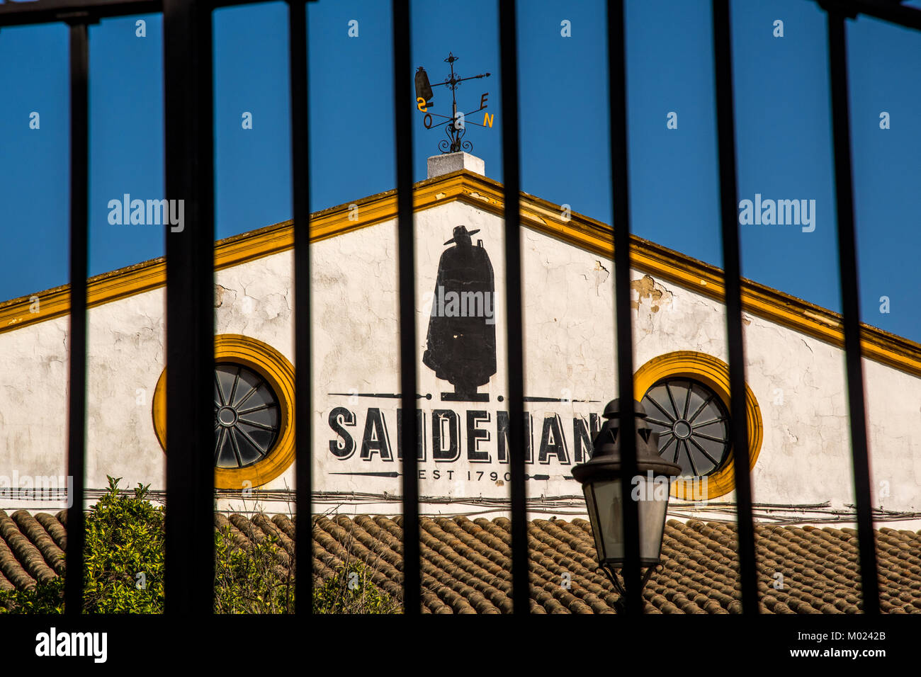 JEREZ DE LA FRONTERA, ANDALUSIA / SPAIN - OCTOBER 11 2017: METAL GATE OF BODEGA SANDEMAN Stock Photo
