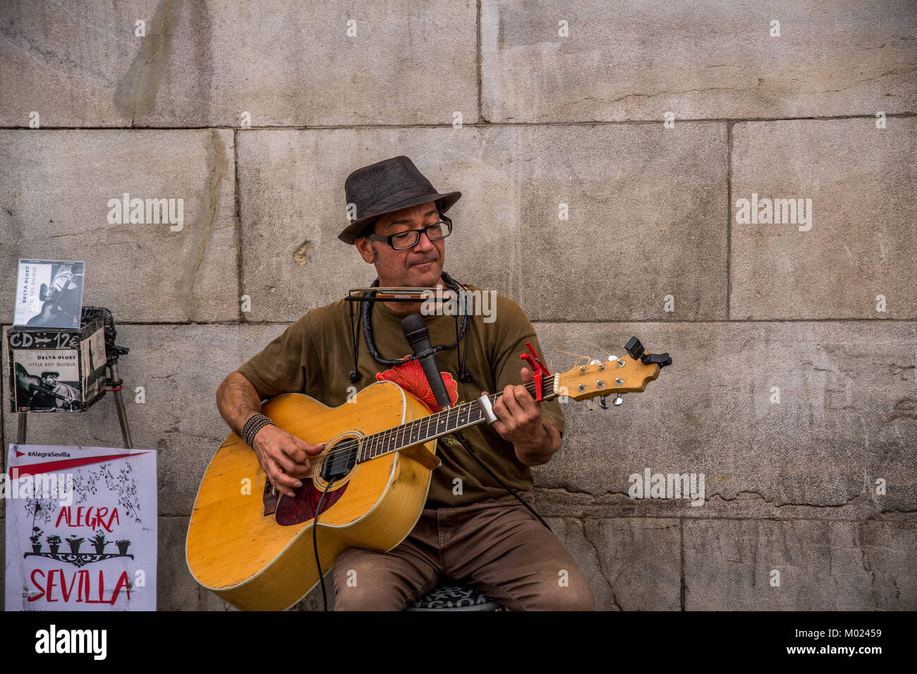 SEVILLE, ANDALUSIA / SPAIN - OCTOBER 13 2017: STREET GUITAR PLAYER Stock Photo