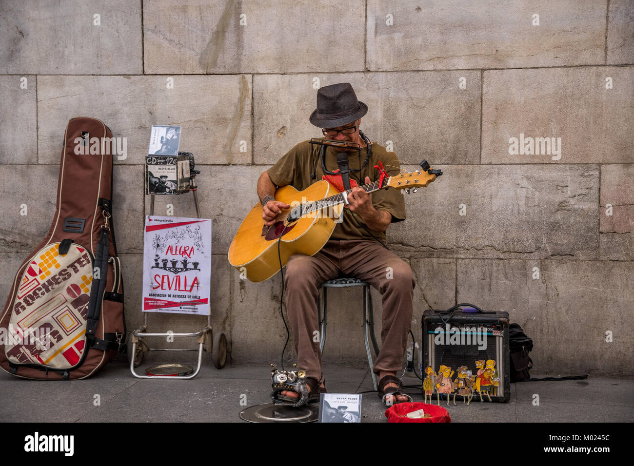 SEVILLE, ANDALUSIA / SPAIN - OCTOBER 13 2017: STREET GUITAR PLAYER Stock Photo