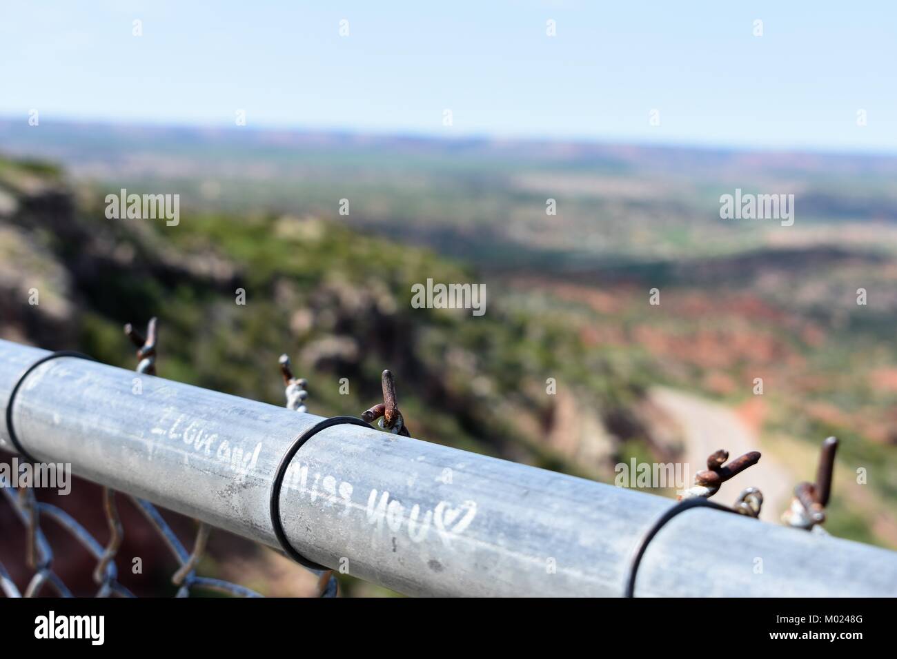 chainlink fence over a canyon Stock Photo