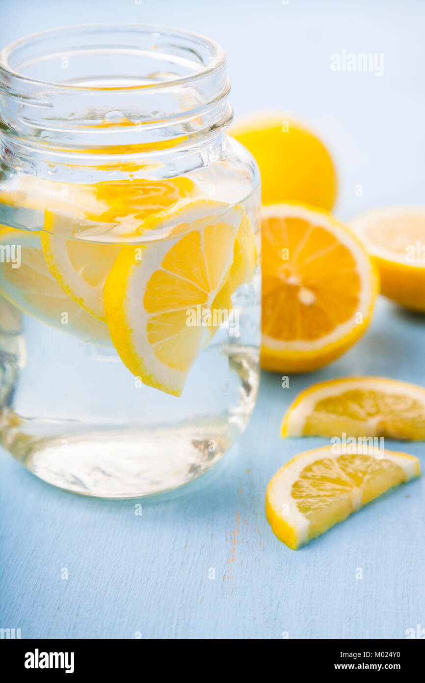 Refreshing ice cold water with lemon ready to drink. Concept of diet. Diet for weight loss Stock