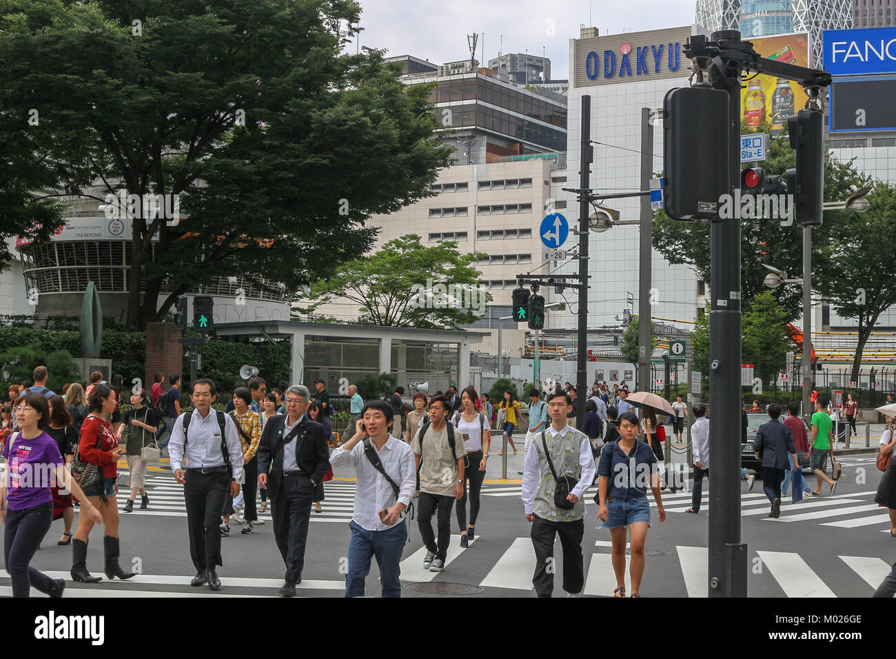 Shinjuku, Tokyo, Japan, Sept 24 2017 People walking at crossing in front of JR Shinjuku Station West Gate on Sunday Morning Stock Photo
