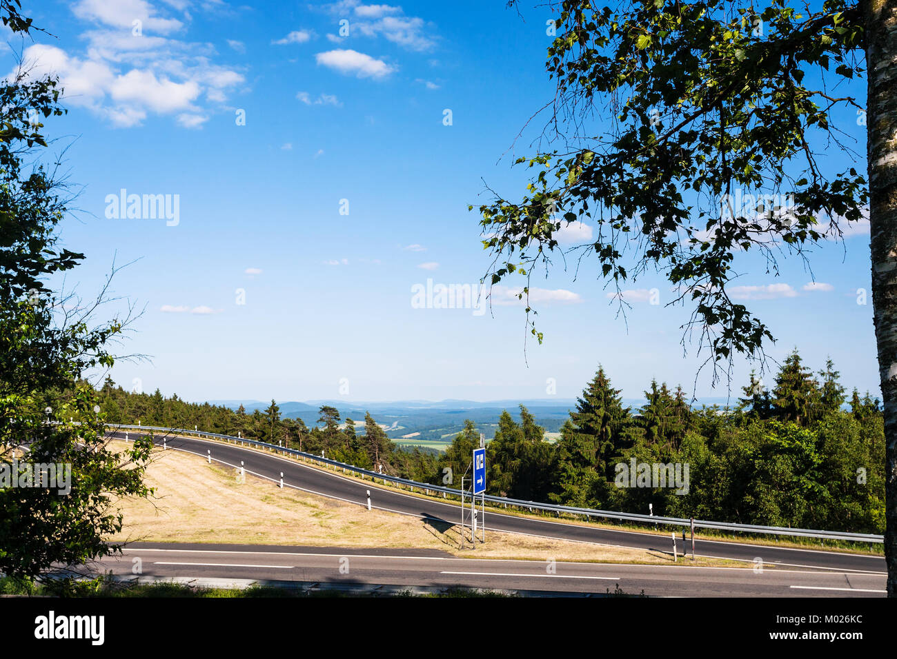 travel to Germany - road on Rimberg mount to Rest and Service Station on Autobahn A5 motorway near Breitenbach am Herzberg town in Hesse State of Germ Stock Photo