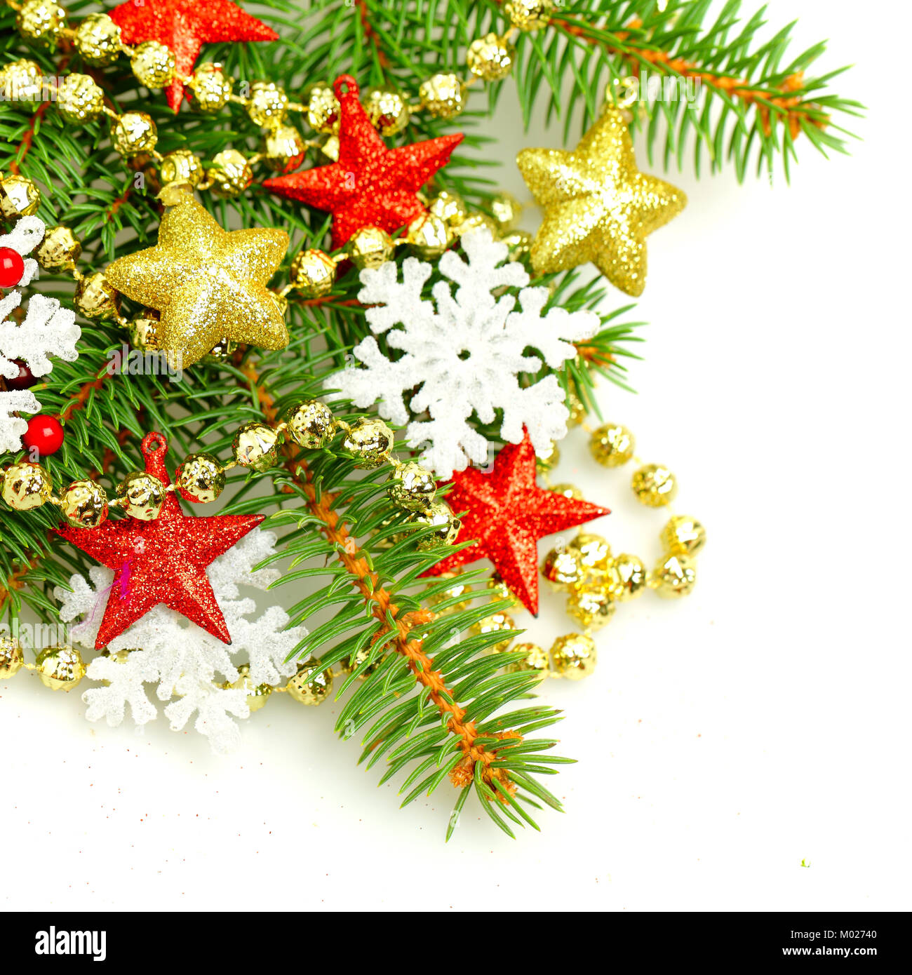 Christmas fir tree twig on decorations background Stock Photo