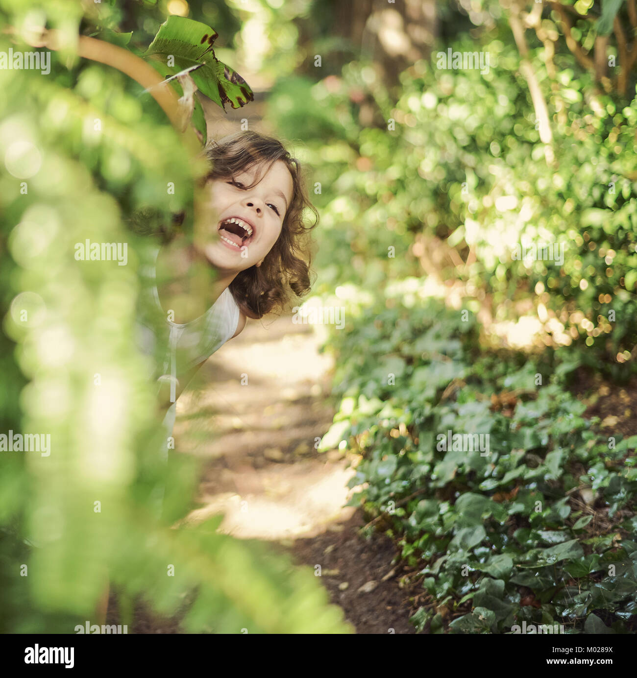 Portrait of a cheerful, little girl Stock Photo - Alamy