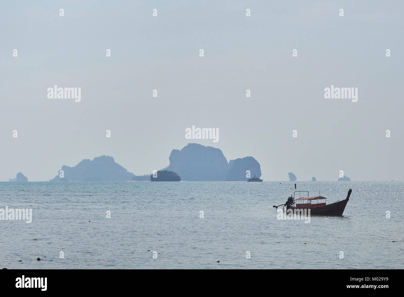Classic Thai long-tail boats at Railay Beach, Krabi Provence, Thailand Stock Photo