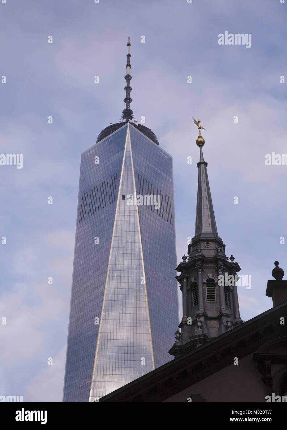 The steeples of religion and capitalism, Saint Paul's Chapel/Trinity Church,  World Trade Center, Freedom Tower, lower Manhattan, NYC. Stock Photo