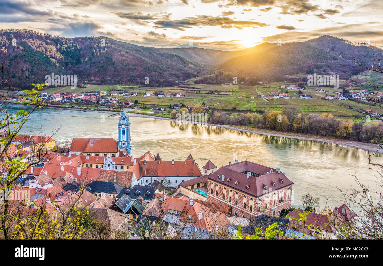Panoramic aerial view of beautiful Wachau Valley with the historic town of Durnstein and famous Danube river in beautiful golden evening light Stock Photo