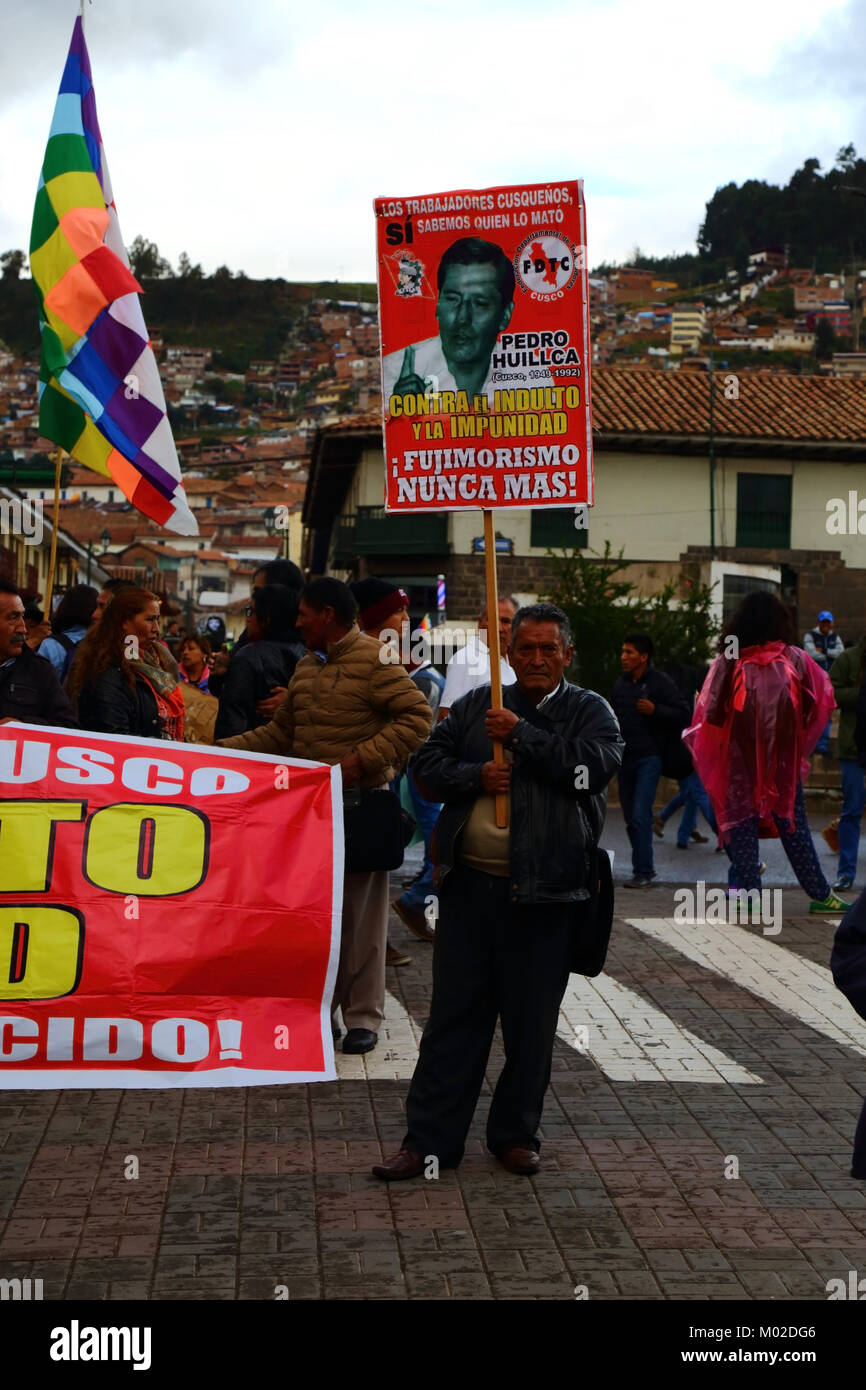 People take part in a march protesting against pardon granted by Peruvian President Kuczynski to former president Alberto Fujimori, Cusco, Peru Stock Photo