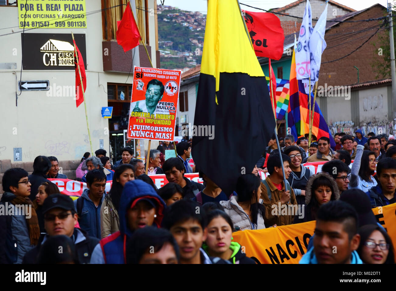 People take part in a march protesting against pardon granted by Peruvian President Kuczynski to former president Alberto Fujimori, Cusco, Peru Stock Photo