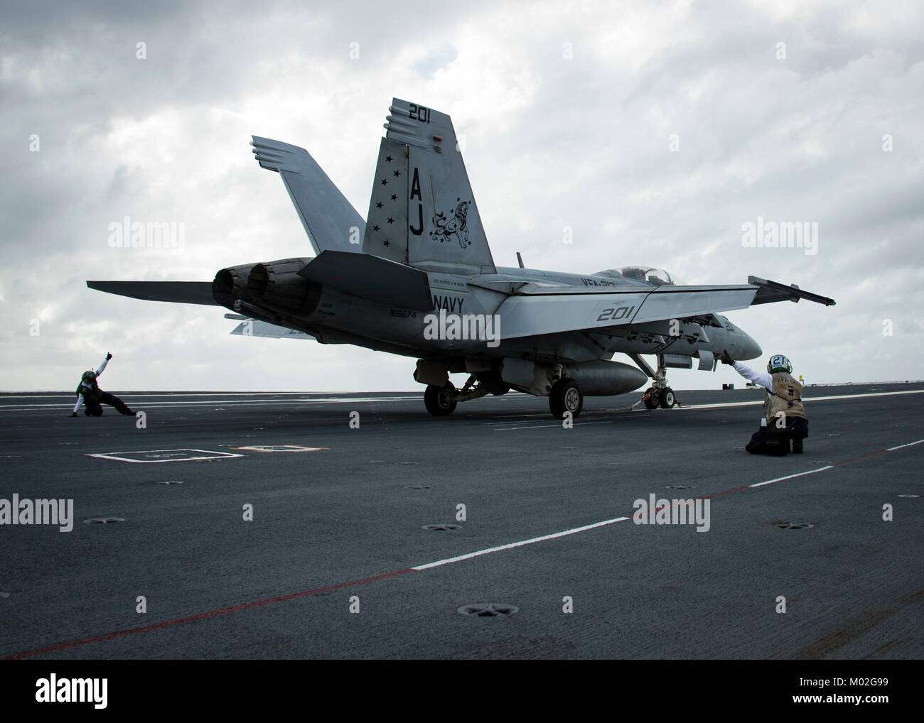 An F/A-18F Super Hornet, assigned to the 'Black Lions' of Strike Fighter Squadron  (VFA) 213, prepares for take off of the flight deck of USS Gerald R. Ford (CVN 78). Stock Photo