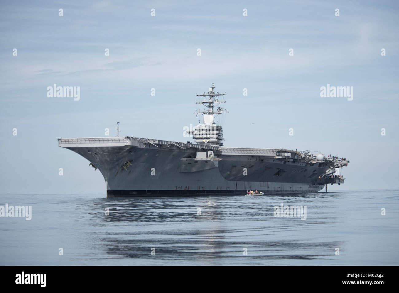 The aircraft carrier USS Dwight D. Eisenhower (CVN 69)(Ike) transits the Atlantic Ocean. Ike is underway during the maintenance phase of the Optimized Fleet Response Plan (OFRP). Stock Photo