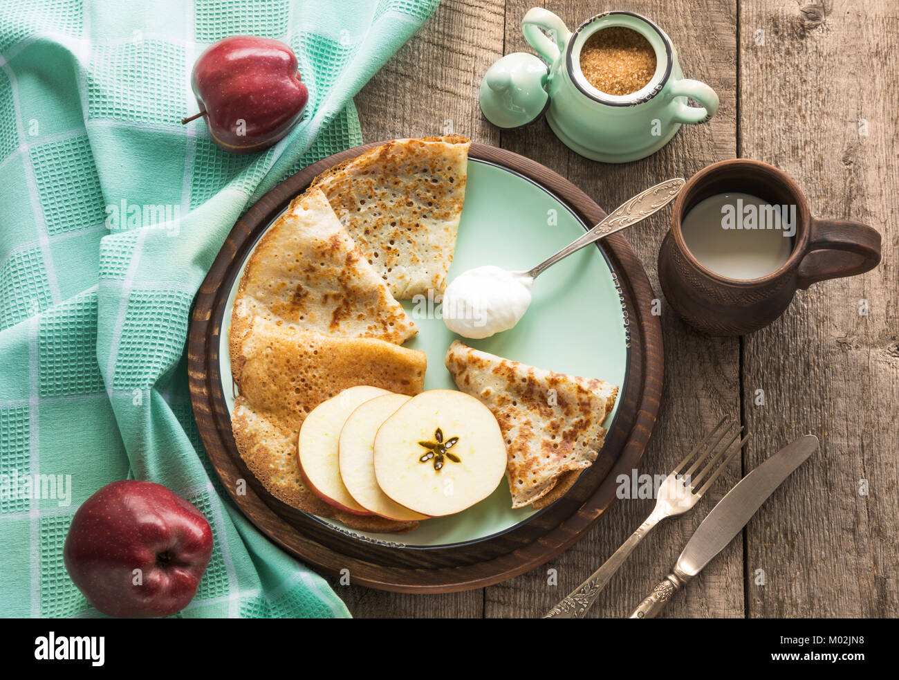 Tasty traditional russian breakfast of slapjack with honey on plate. Rustic  style. Space for your text and top view Stock Photo - Alamy