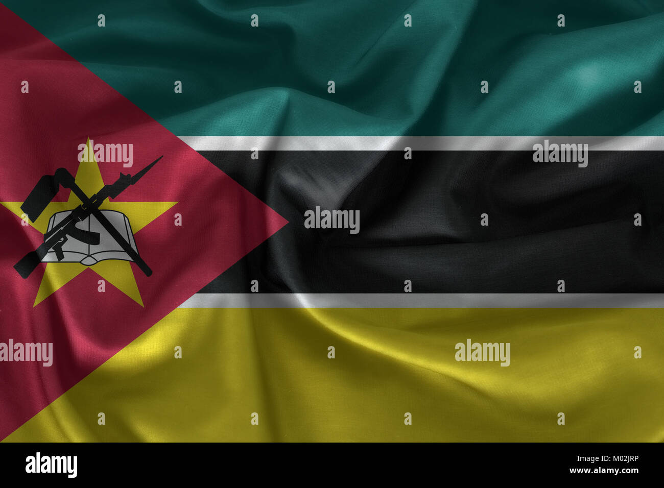 Mozambique flag pattern on the fabric texture Stock Photo