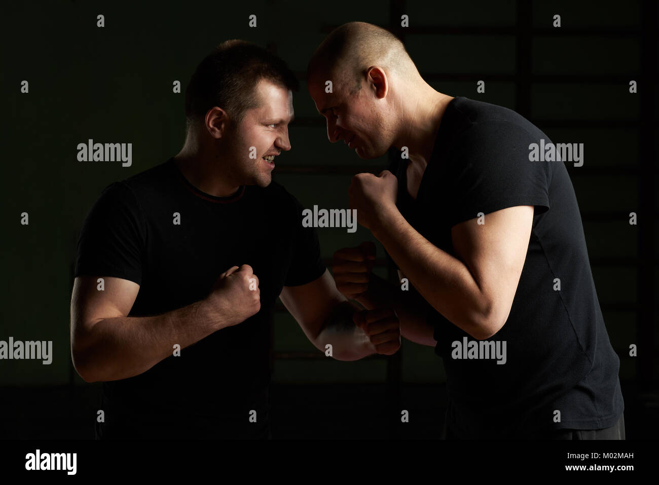 Two angry young man concept. Conflict situation between people Stock Photo