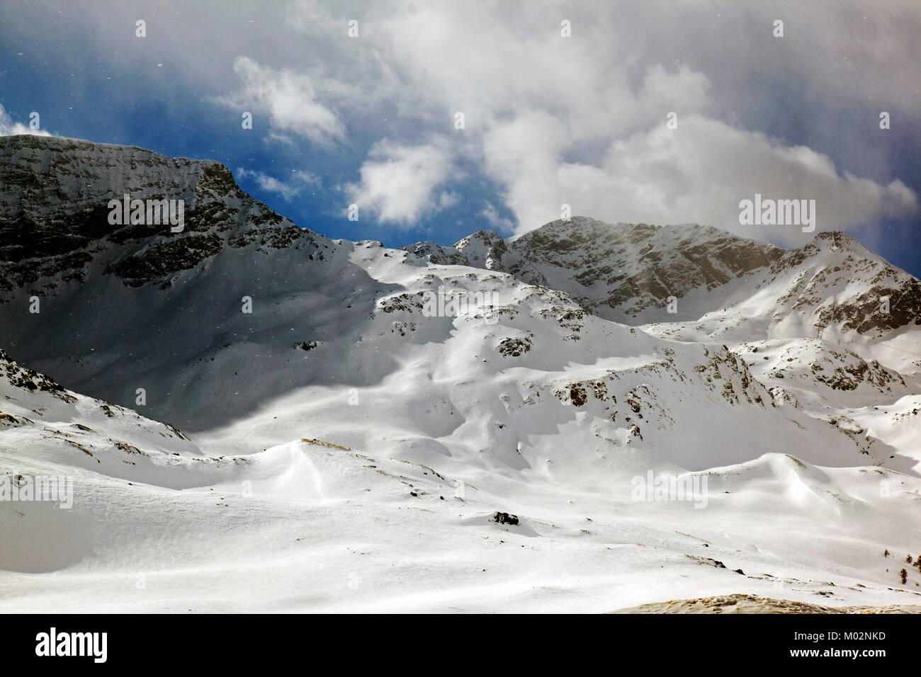 A view of snow covered mountains in the alps switzerland Stock Photo ...