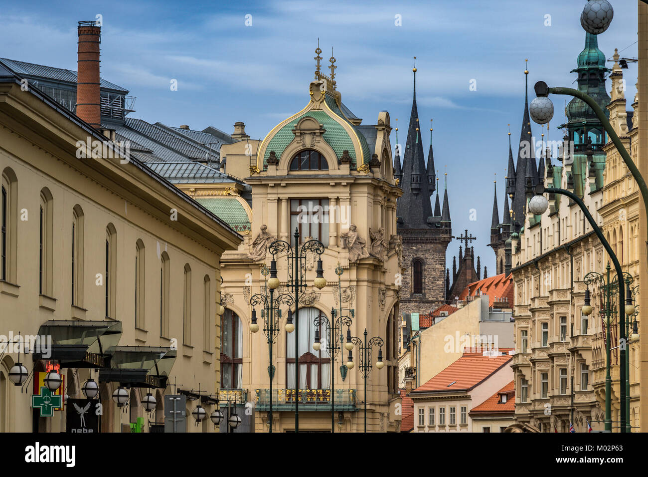 Municipal House and The Smetana Hall concert venue  with the Twin Gothic steeples of the Church of Our Lady before Tyn in the distance Stock Photo