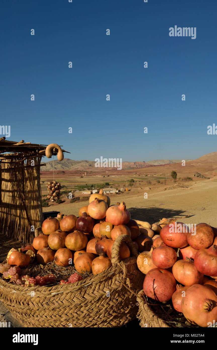 Roadside stall selling pomegranates, Middle Atlas Region. Morocco, North Africa Stock Photo