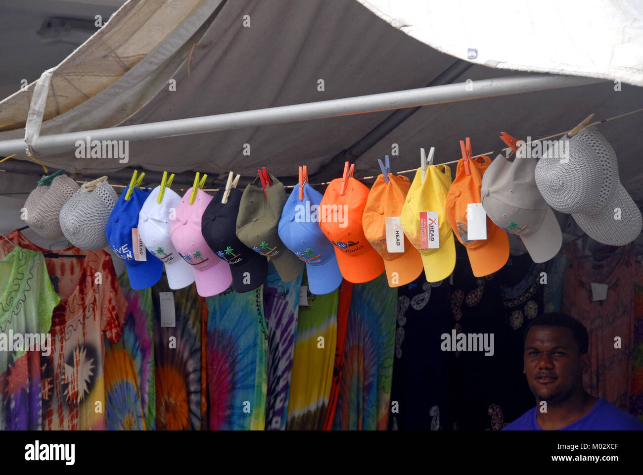 Row of multi-colored hats for sale, St Lucia, Caribbean Stock Photo