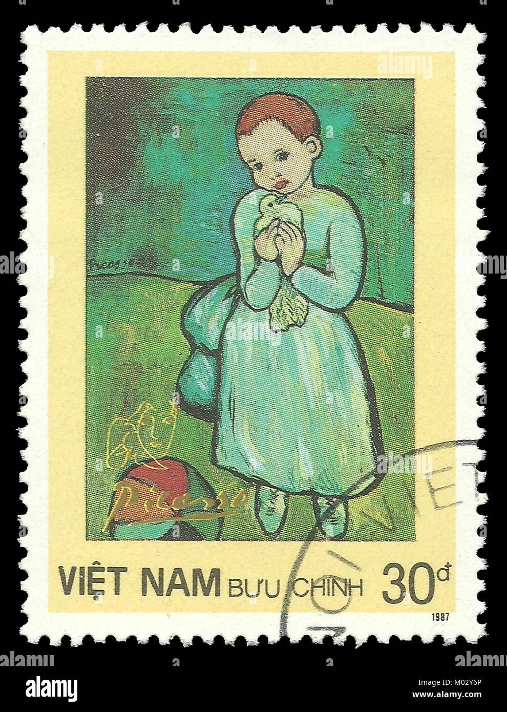 Vietnam - stamp 1987: Color edition on Art, shows Painting Child Holding a Dove by Pablo Picasso Stock Photo