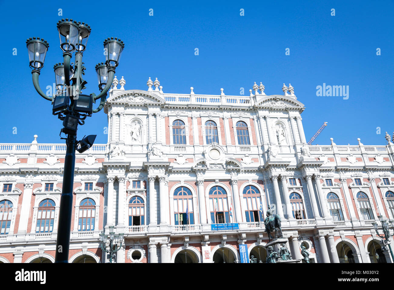 Turin, Italy: Biblioteca Nazionale and Museum of Risorgimento italiano in the historical square of Turin city center, in a sunny day Stock Photo