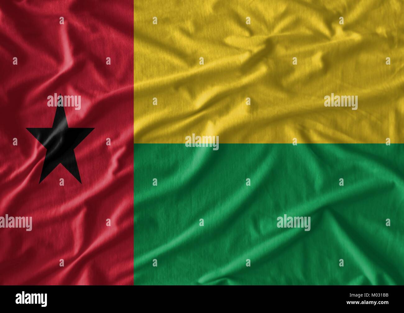 Guinea Bissau flag pattern on the fabric texture Stock Photo