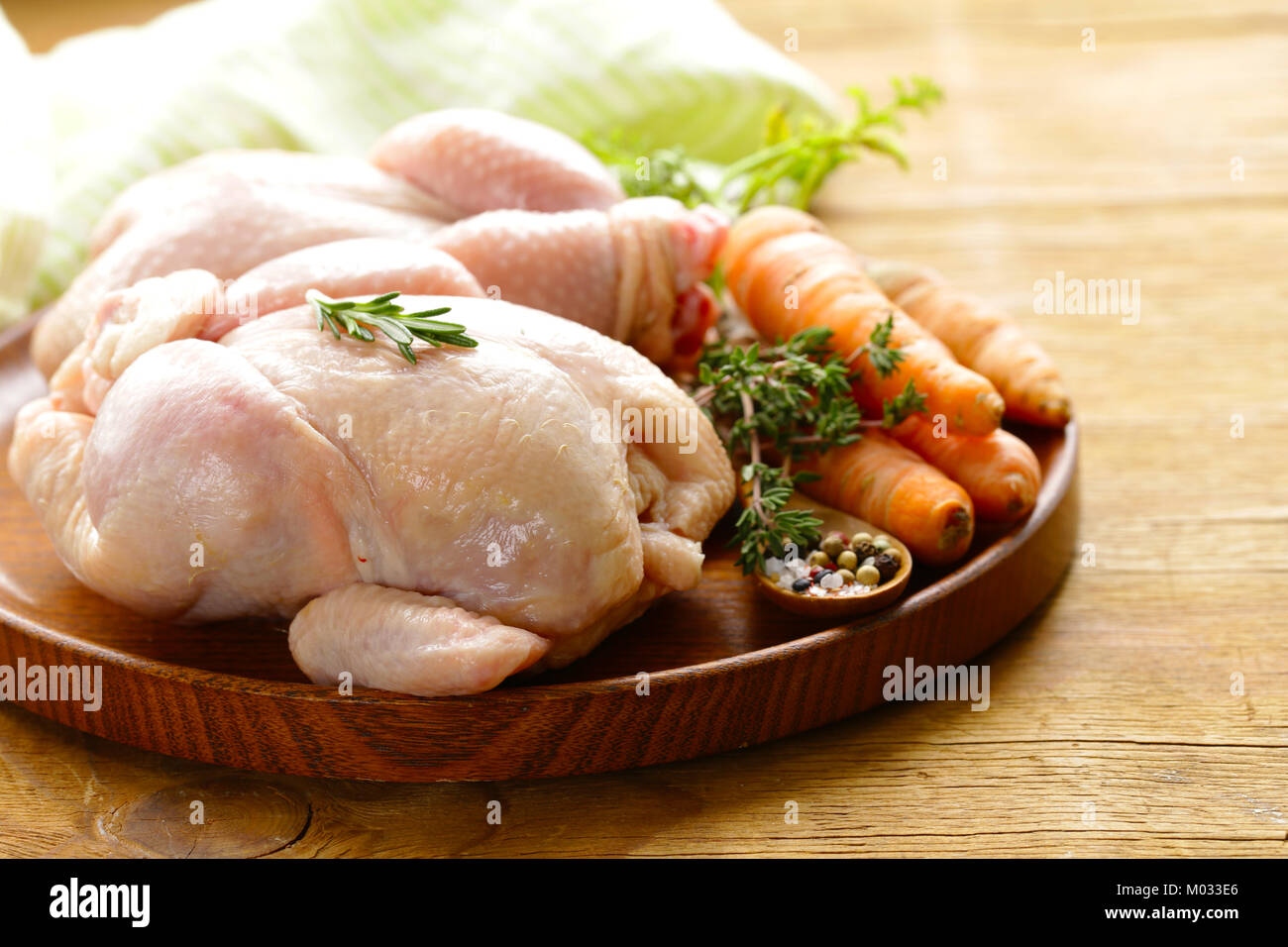 Raw whole chicken fresh herbs hi-res stock photography and images - Alamy