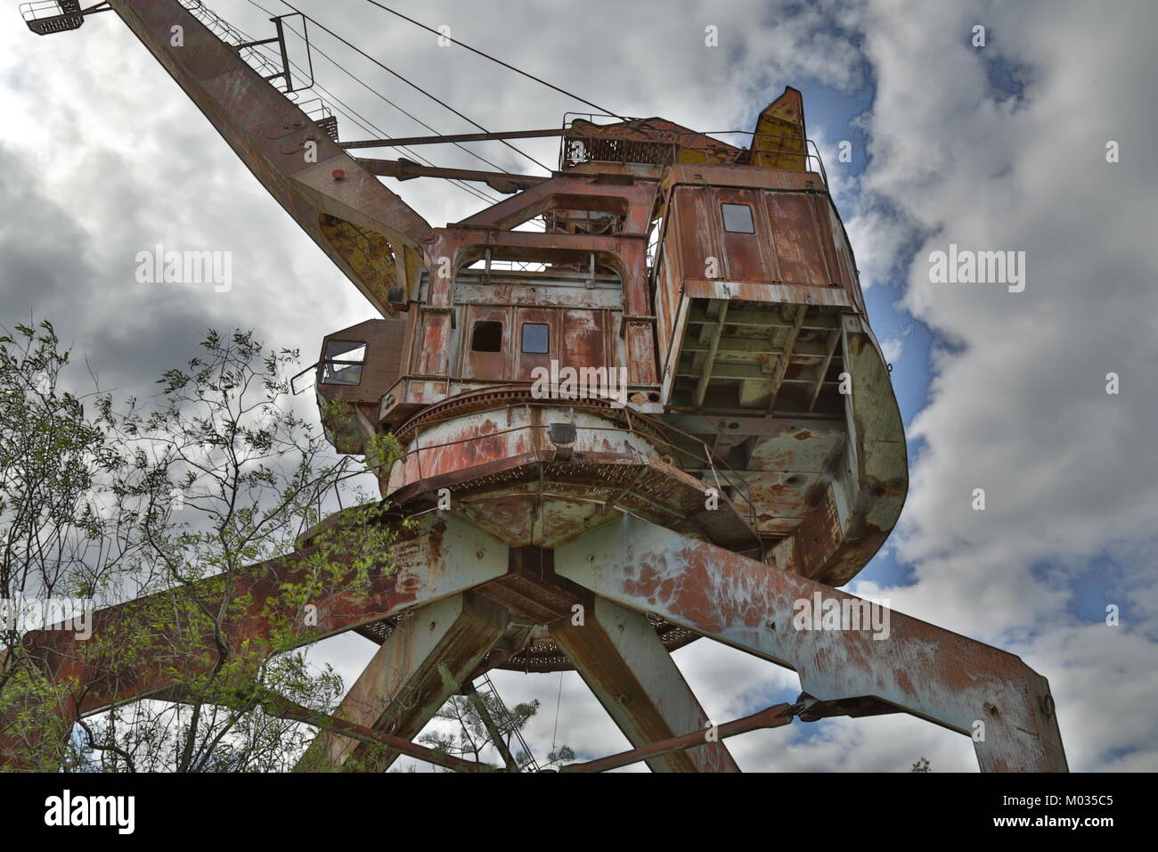 Abandoned cranes in the Chernobyl river port Stock Photo