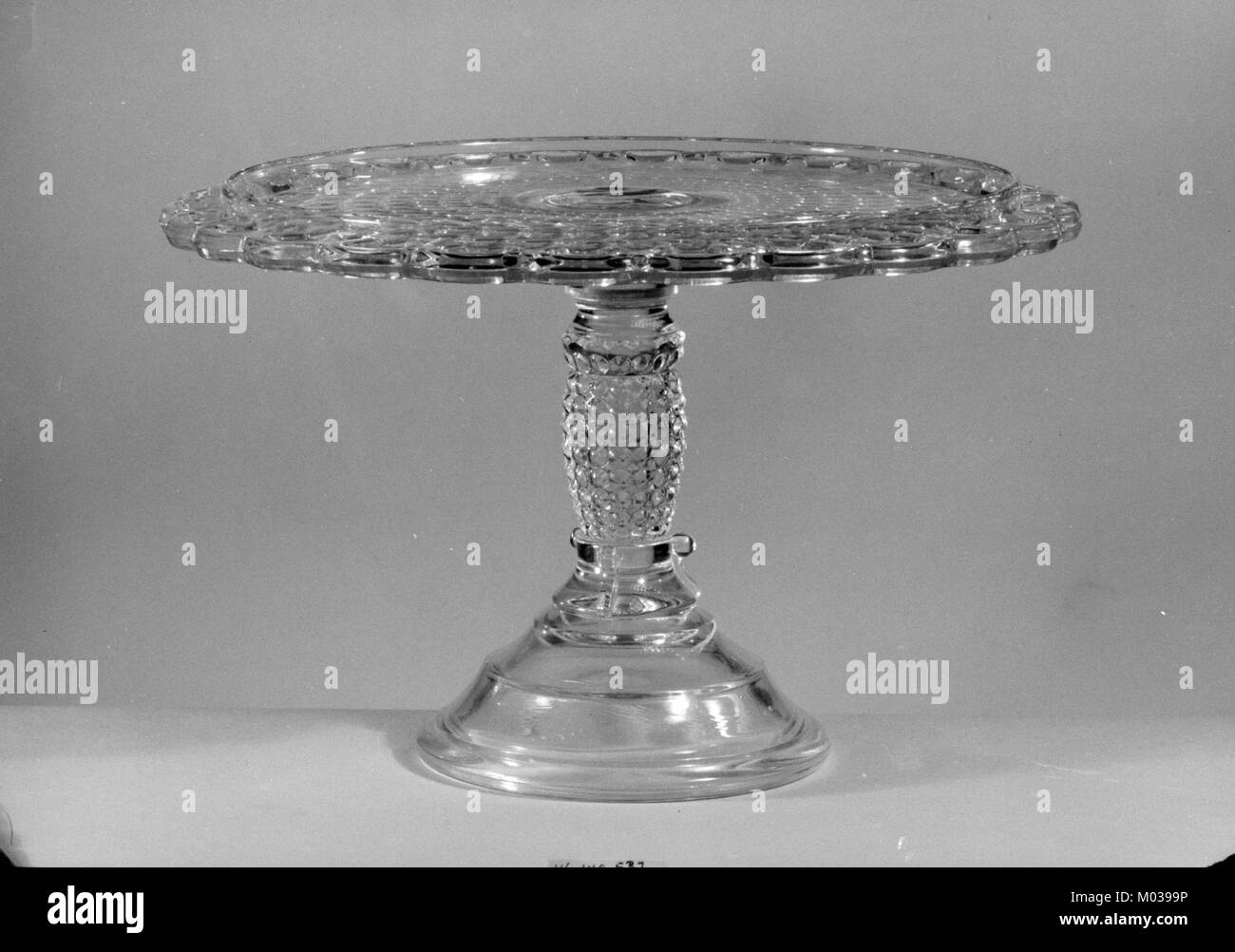 This cake plate, part of the collection at the Metropolitan Museum of Art, is an exquisite example of decorative porcelain. It showcases fine craftsmanship and design, reflecting the cultural artistry of its time. Stock Photo