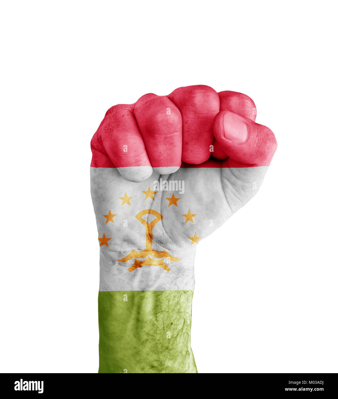 Flag of Tajikistan painted on human fist like victory symbol Stock Photo