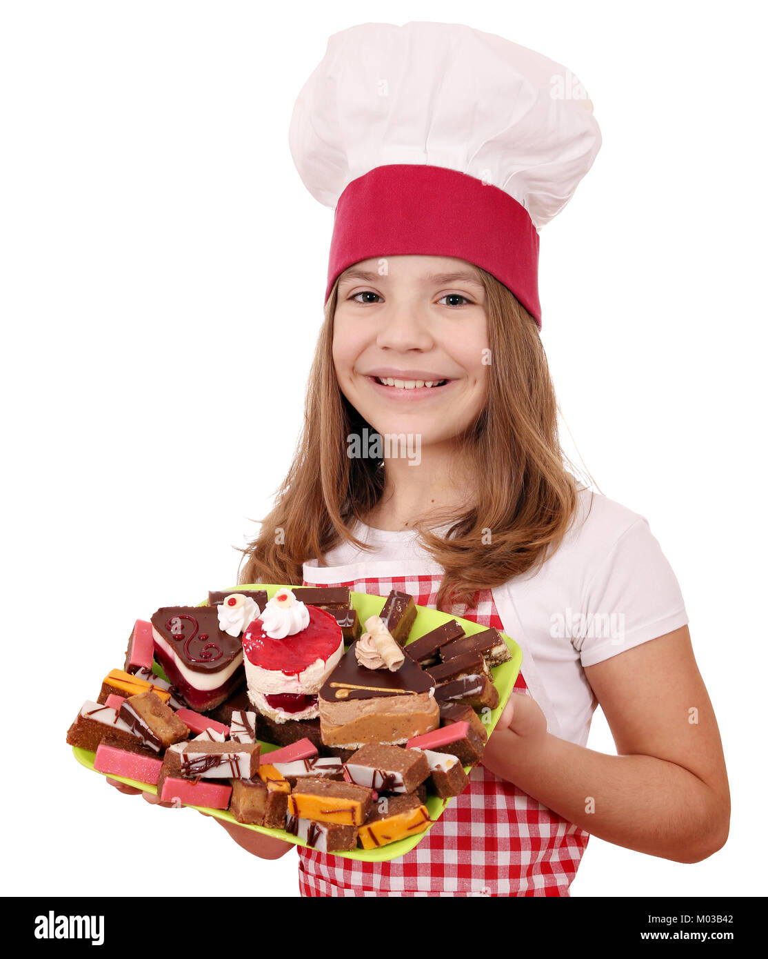 happy little girl cook with cakes dessert Stock Photo Alamy