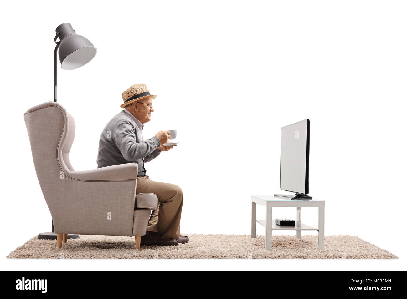Man armchair watching tv hires stock photography and images Alamy