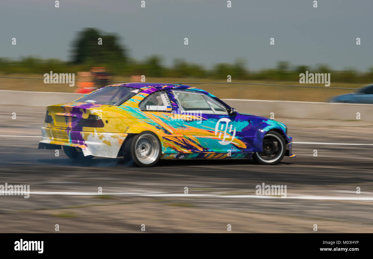 Vinnytsia,Ukraine-July 24, 2015: Rider Vladimir Nikiforov on the car ...