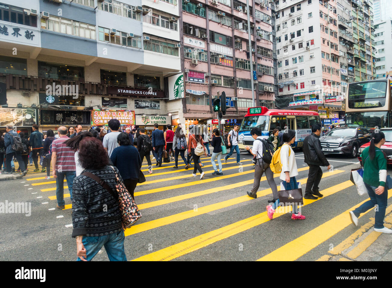 Hong Kong A street scene on Mong Kok with pedestrian zebra crossing