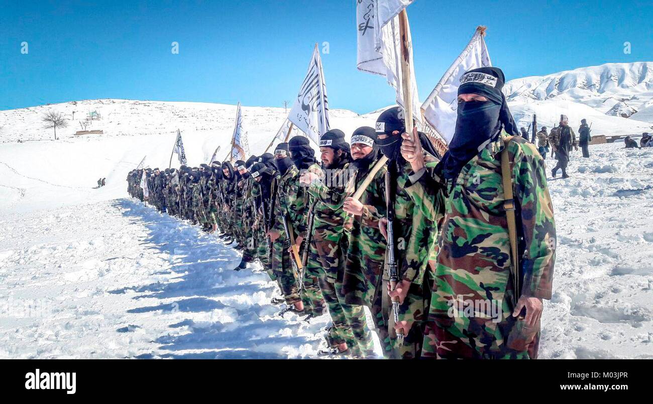 Still image taken from a propaganda video released January 14 2018 showing Taliban fighters in a snow covered mountain training camp in Faryab Province, Afghanistan. Stock Photo