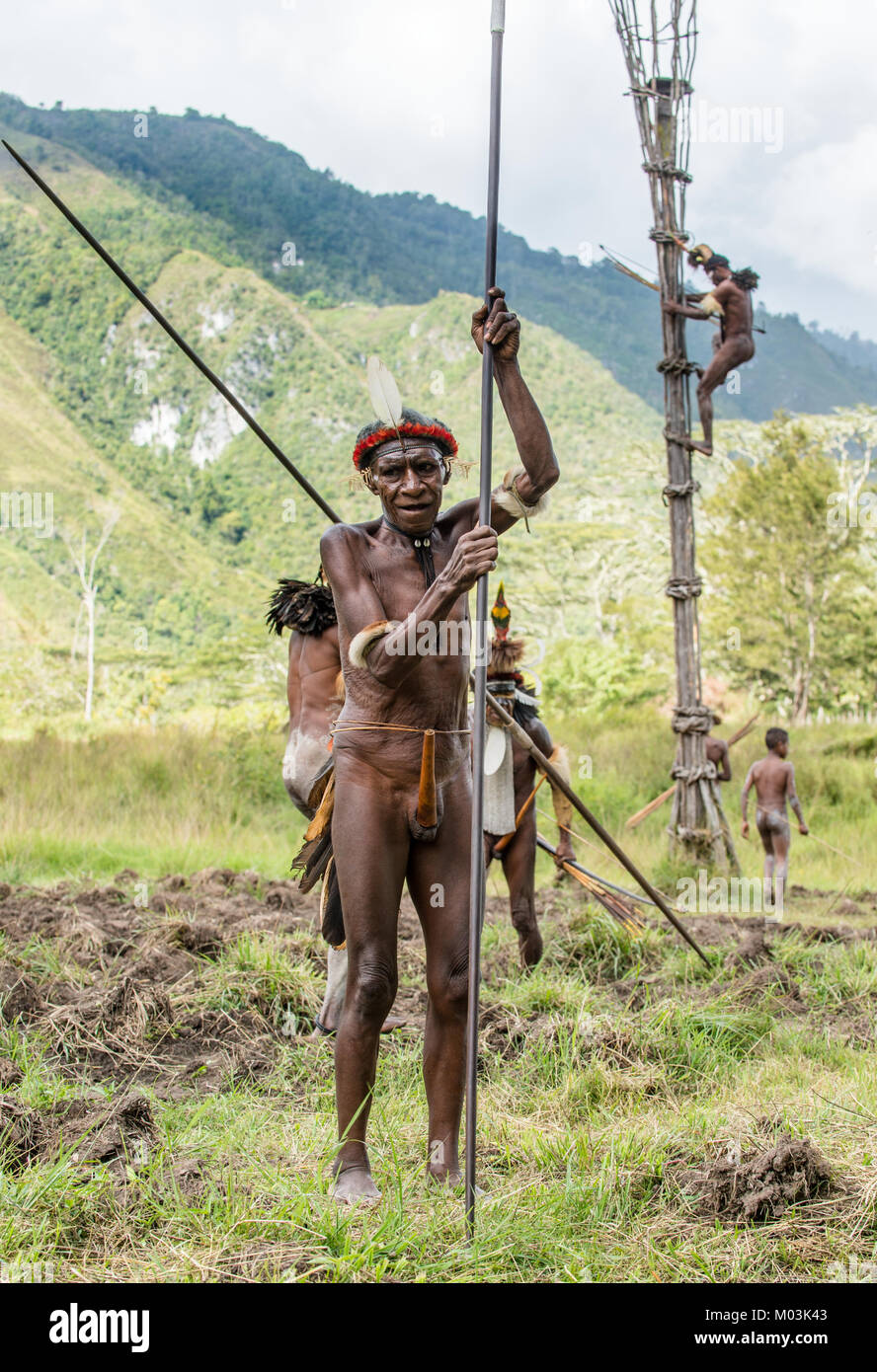 The armed Papuan. Warrior of Dani Dugum tribe with spear. June 4, 2016, New Guinea Island. Stock Photo