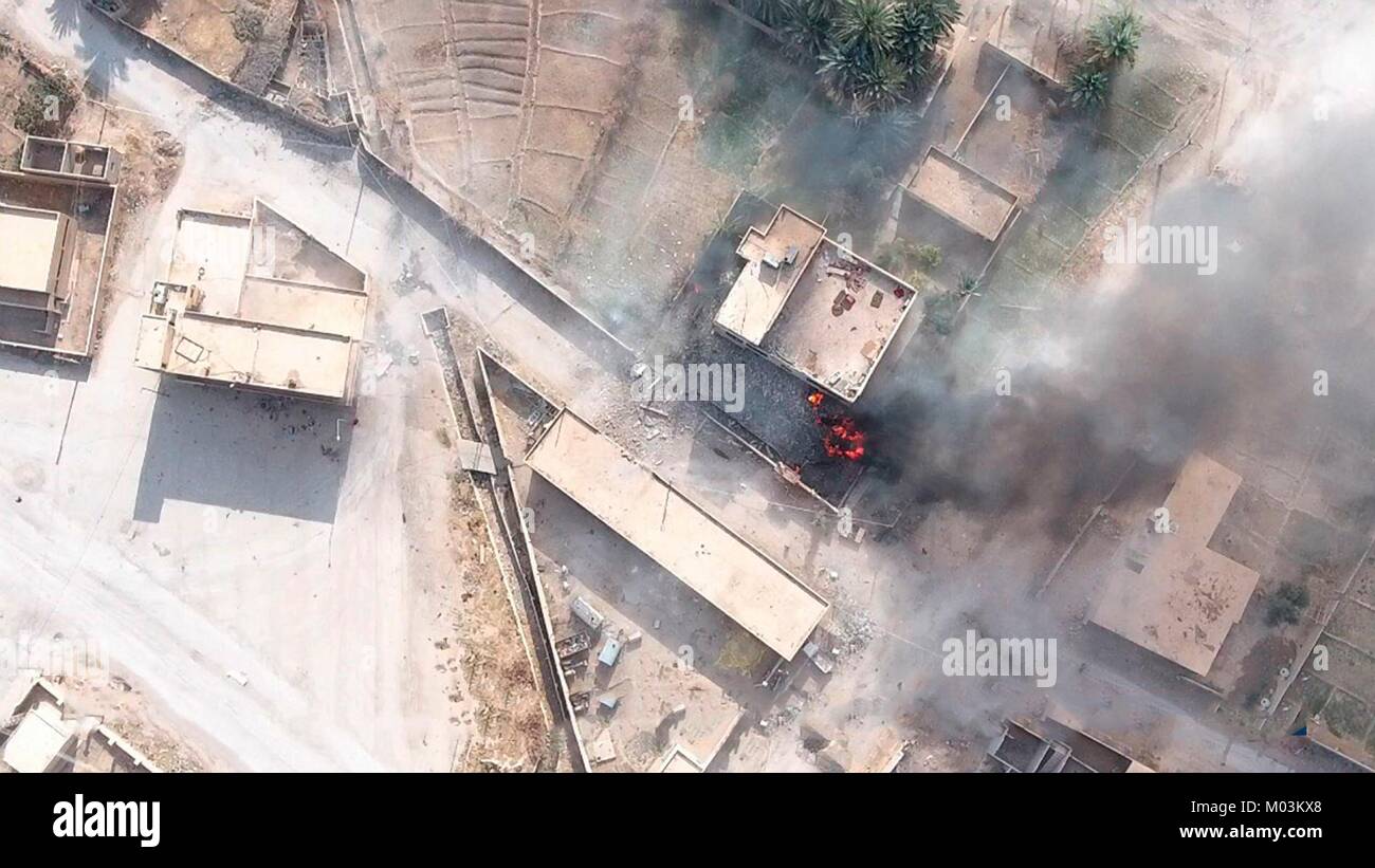 Still image taken from a propaganda drone video released January 18, 2018 showing Islamic State suicide bomber attack on a Syrian Army positions in Deir ez-Zor, Syria. Stock Photo