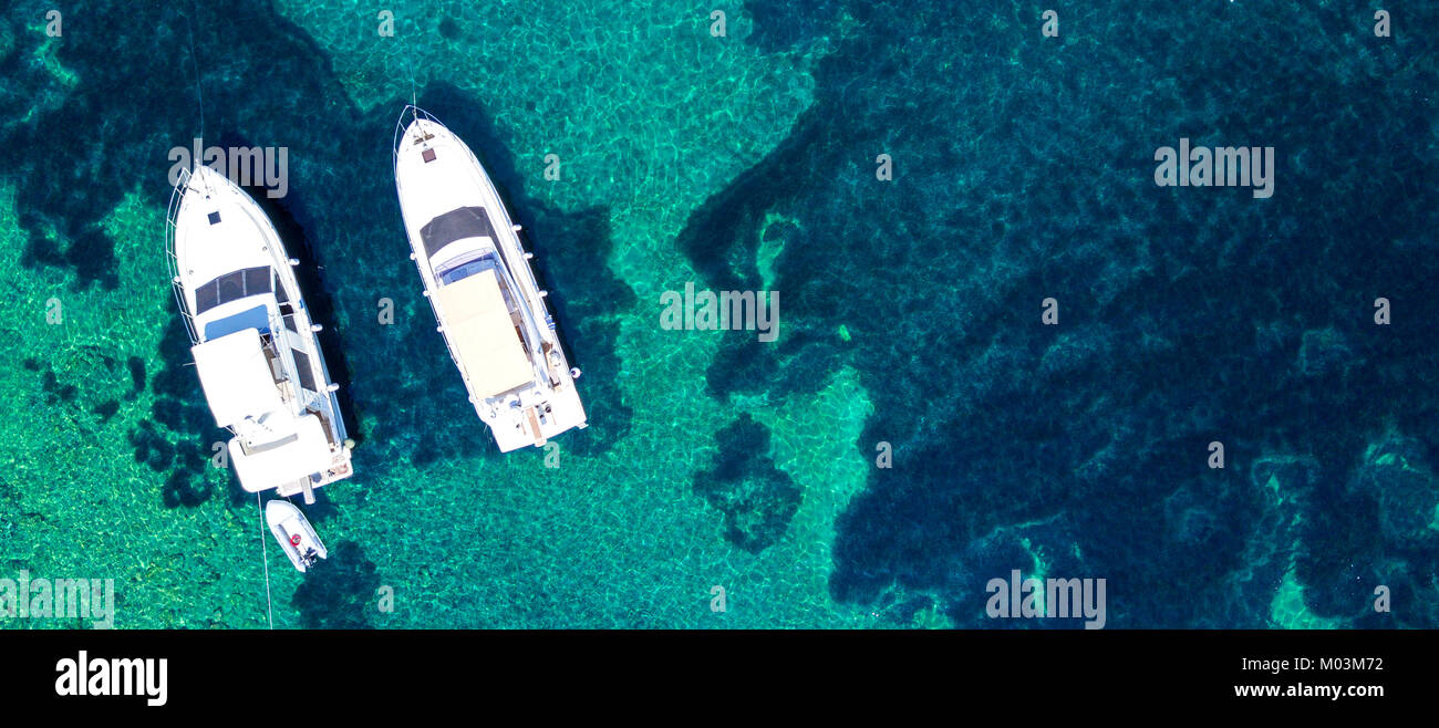 Aerial view of two yachts and clear turquoise sea Stock Photo - Alamy