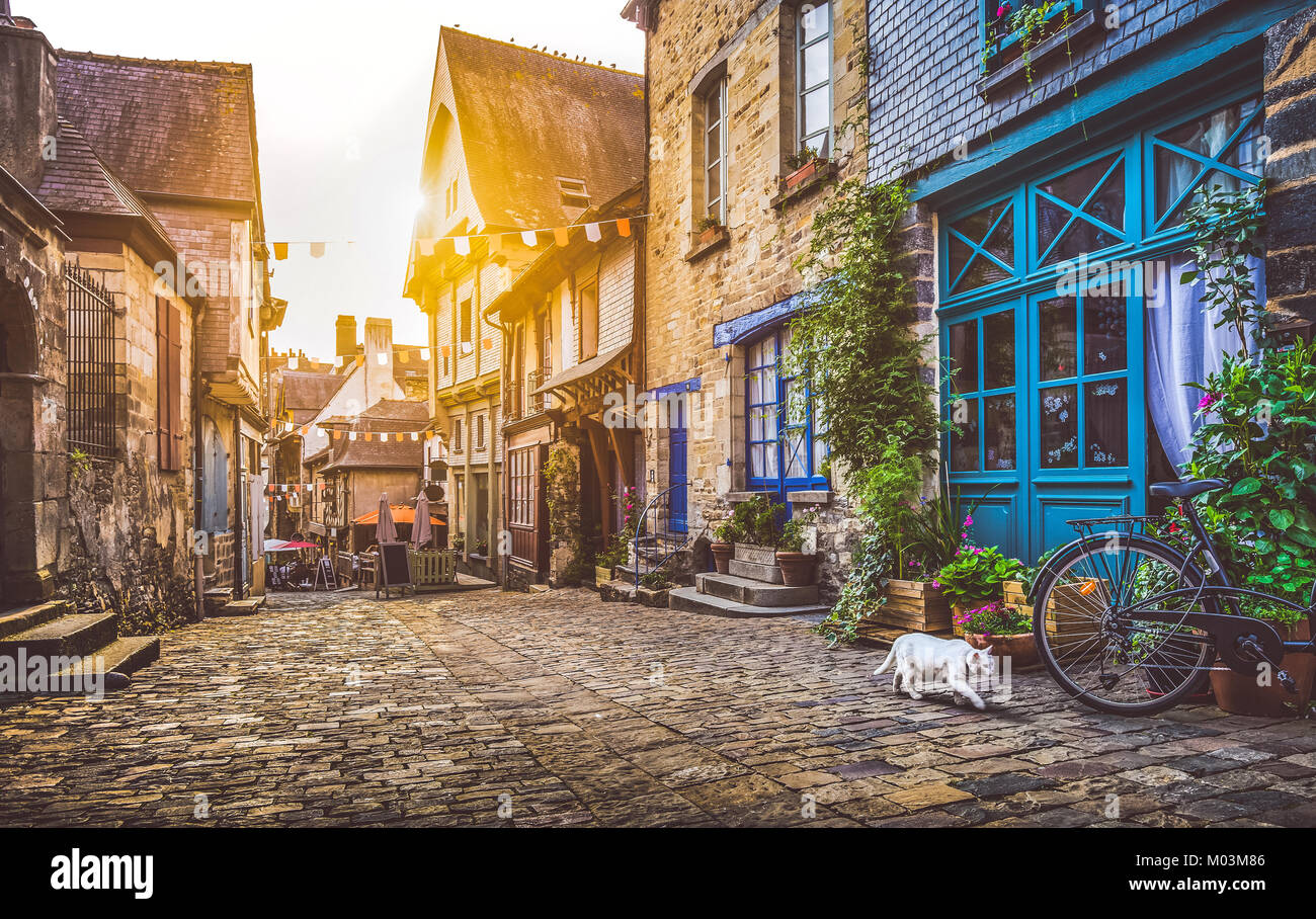 Old town in Europe at sunset with retro vintage Instagram style filter and lens flare effect Stock Photo