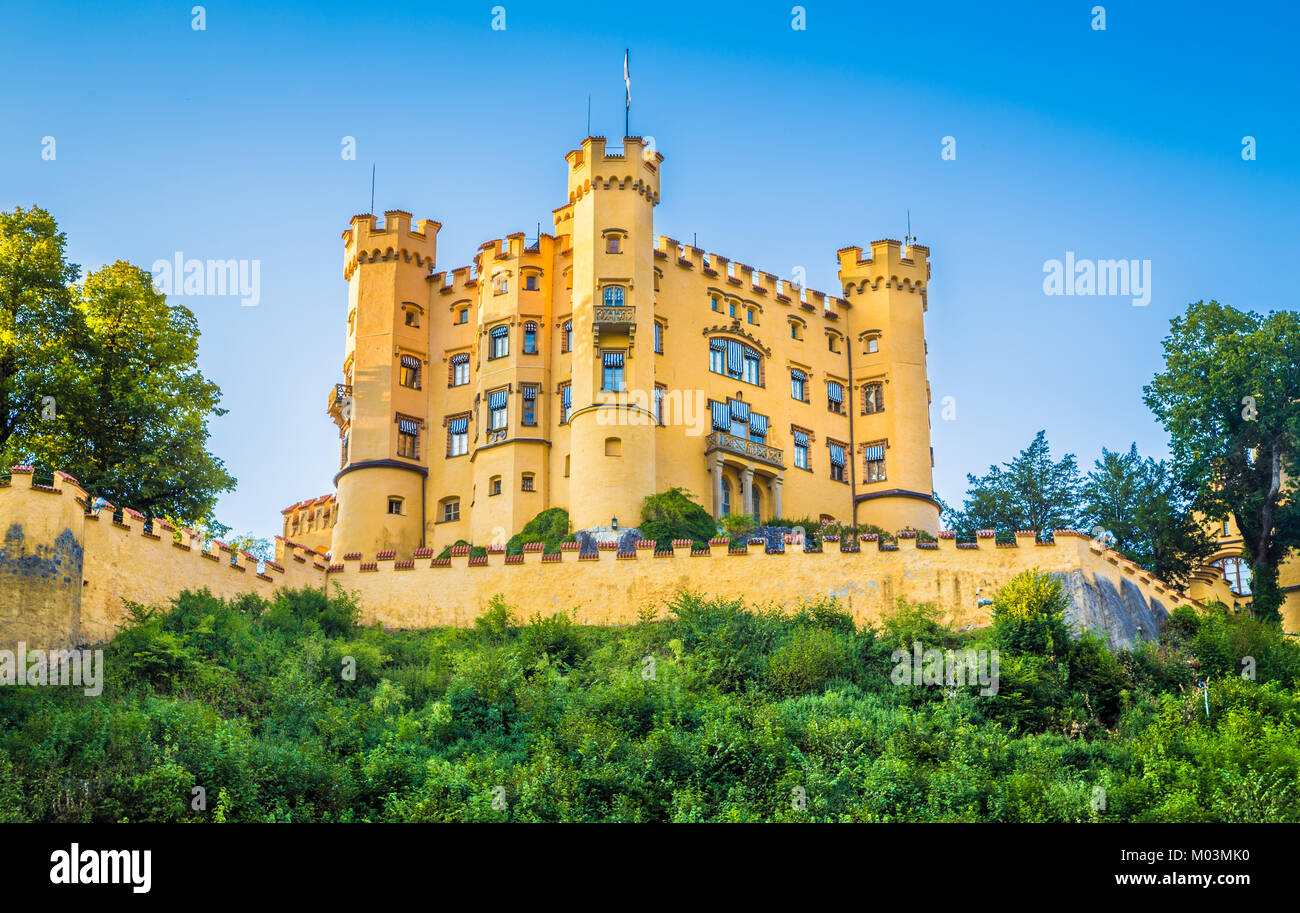 Beautiful view of world-famous Hohenschwangau Castle, the 19th century childhood residence of King Ludwig II of Bavaria, at sunset, Füssen, Germany Stock Photo