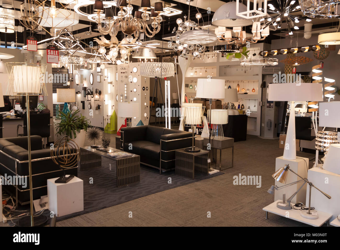 Modern lighting and lamps on display in a retail store interior. Stock Photo