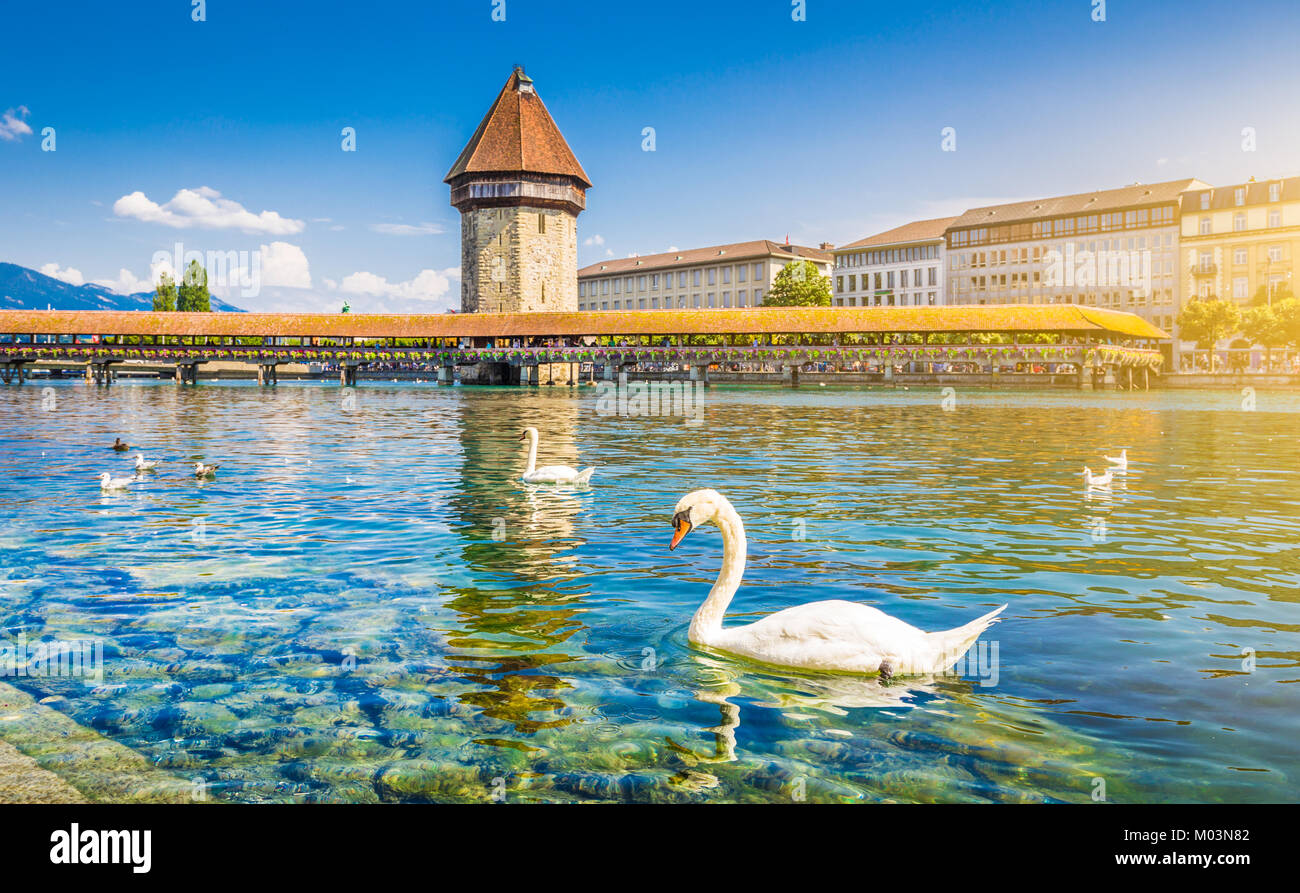 Historic city center of Lucerne with famous Chapel Bridge, the city's symbol and one of the Switzerland's main tourist attractions on a sunny day Stock Photo