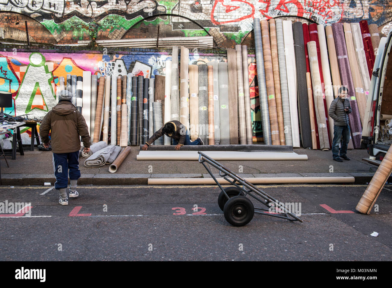 Carpet for sale at Brick Lane's Sunday Market UK Stock Photo