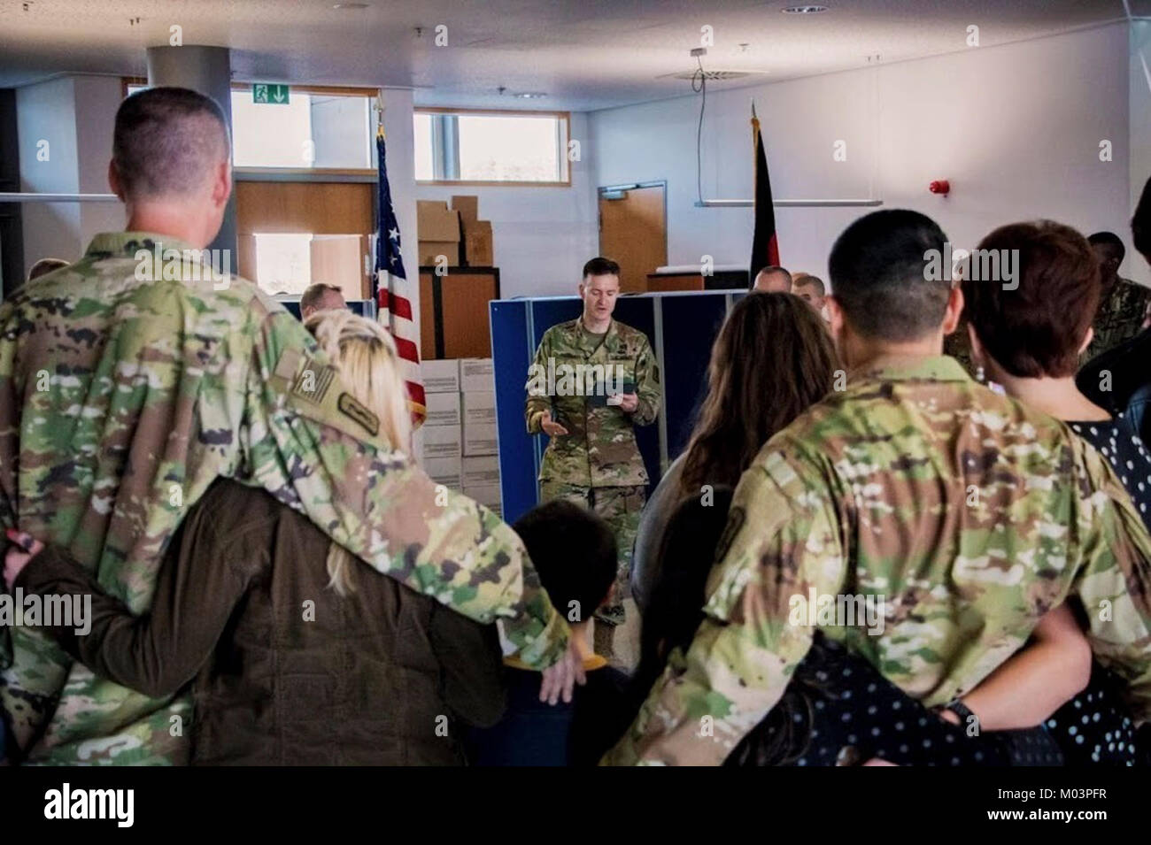 Lt. Col. Robert Parish, 254th Medical Detachment commander, welcomes his detachment home during a redeployment ceremony,  Jan. 11, at the Ramstein Air Terminal in Kaiserslautern, Germany. The combat operational stress control unit completed a 9-month deployment to Central Command area of responsibility. Stock Photo