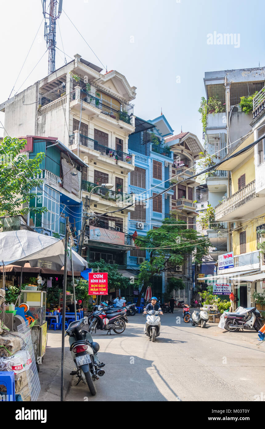 Hanoi,Vietnam - October 31,2017 : Local daily life of the street in Hanoi, Vietnam. People can seen exploring around it. Stock Photo
