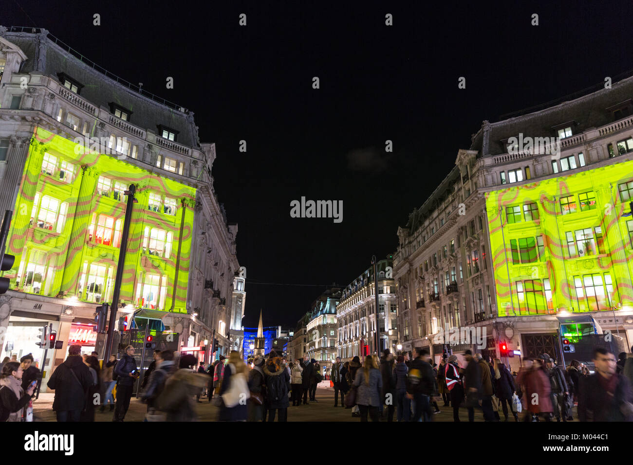 London, UK. 18th Jan 2018. Lumiere London 2018 Lights festival.  Oxford Circus and parts of Regent Street are closed to traffic as people view the colourful images projected  onto buildings on Oxford Circus. Lumiere London is a light festival that presents an array of public art work and light installations across the capital. Credit: Imageplotter News and Sports/Alamy Live News Stock Photo