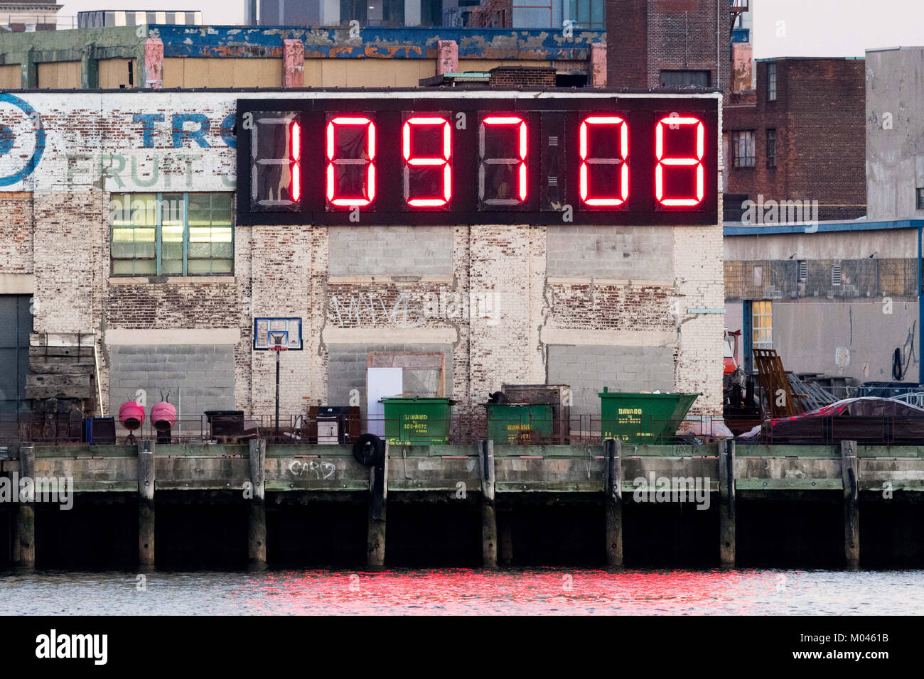 Queens, NY, USA. 18th Jan, 2018. A Very large digital countdown clock showing the number of days and hours left until the next US presidential inauguration day on January 20, 2021. The clock is located in the Long Island City section of Queens in New York City facing the East River and Manhattan and is easily visible from a large part of the east side of Manhattan. The clock is also known as the ''Trump Countdown Clock''. Photo taken on January 18, 2018 at about 4:50pm which is, as shown in the photo, 1,097 days and 8 hours until the next US presidential inauguration day. (Credit Stock Photo