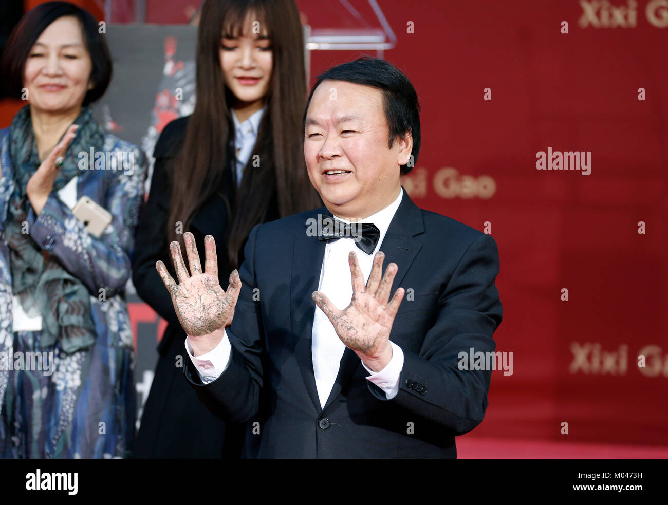 Los Angeles, USA. 18th Jan, 2018. Chinese director Gao Xixi attends his print ceremony in the forecourt of the TCL Chinese Theatre in Los Angeles, the United States, Jan. 18, 2018. Credit: Li Ying/Xinhua/Alamy Live News Stock Photo