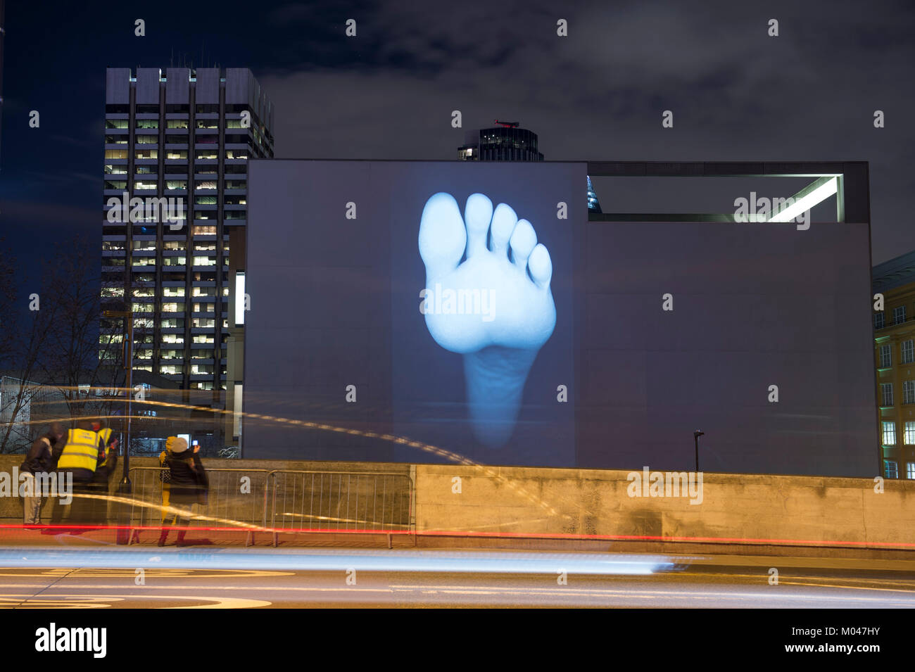 London, UK. 18th Jan, 2018. Locations around central London feature spectacular light displays created by 40 world-class artists. 'Light on their Footfalls for Rambert' by David Ward is created on the outside of the Rambert building Upper Ground, seen from Waterloo Bridge. Credit: Malcolm Park/Alamy Live News. Stock Photo